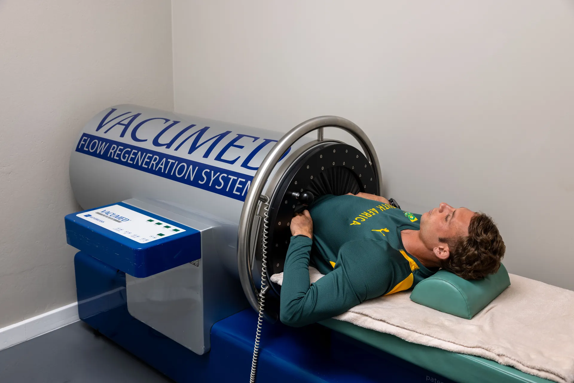 South African athlete Morné van As in the VACUMED intermittent vacuum therapy system at the Botthms Wellness Hub, Randburg