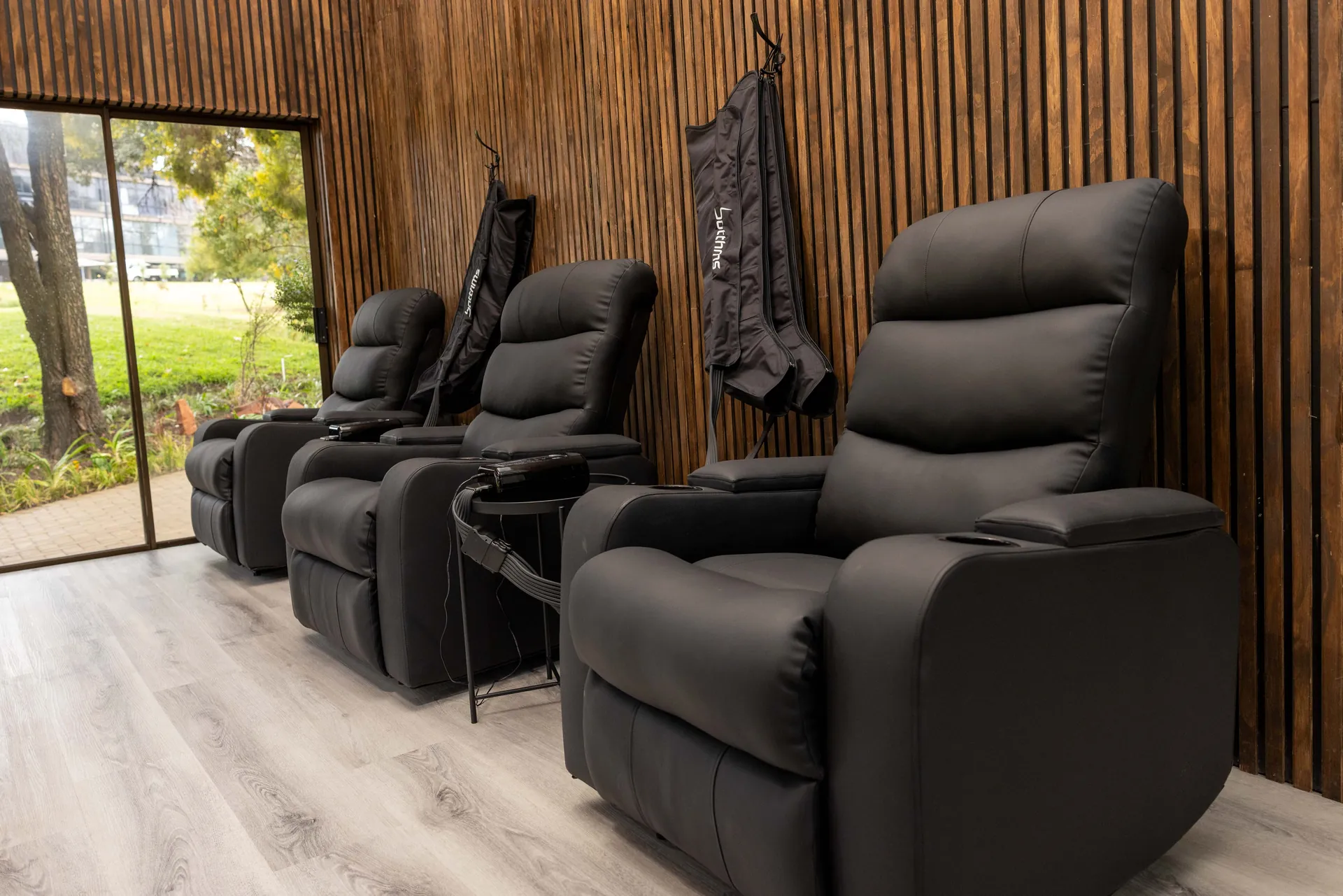 botthms compression recovery boots and recliners in the Botthms Wellness Hub recovery lounge, Randburg